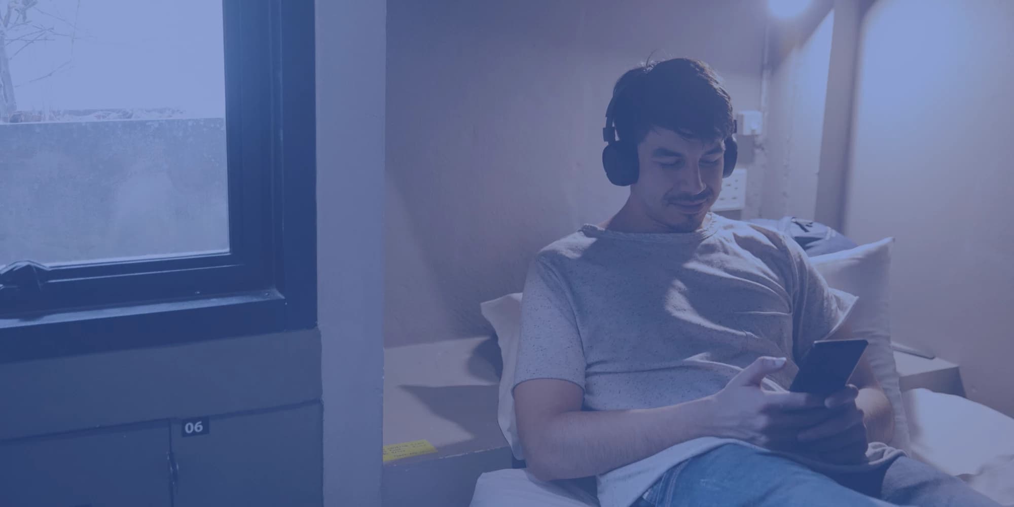 person listening to music with headphones